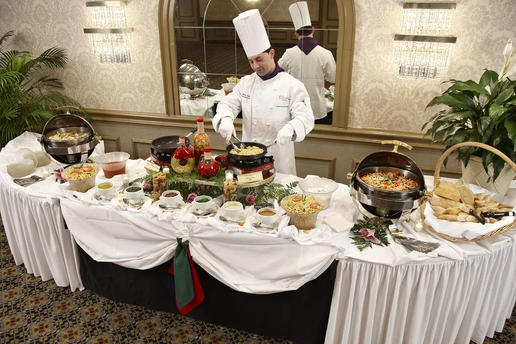 Chef preparing food at live station Toronto